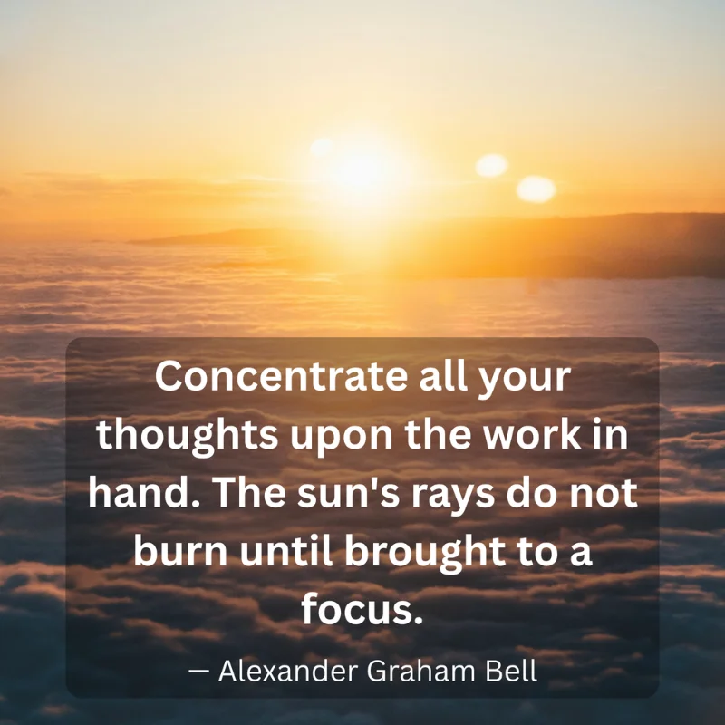 Motivational quote on focus by Alexander Graham Bell overlaid on a golden sunrise above the clouds
