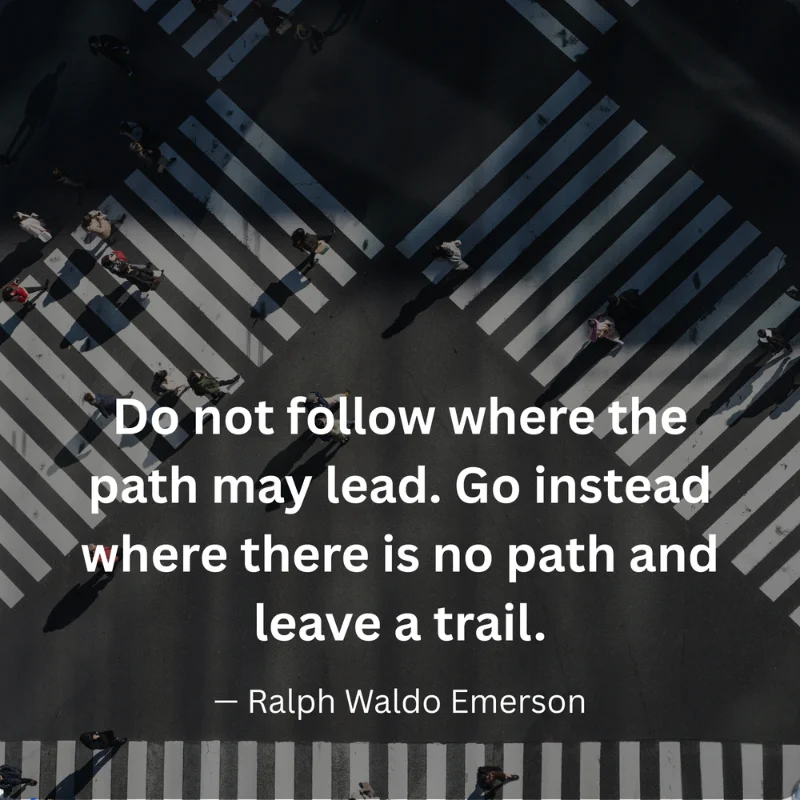 Motivational quote by Ralph Waldo Emerson overlaid on an aerial view of a pedestrian crosswalk