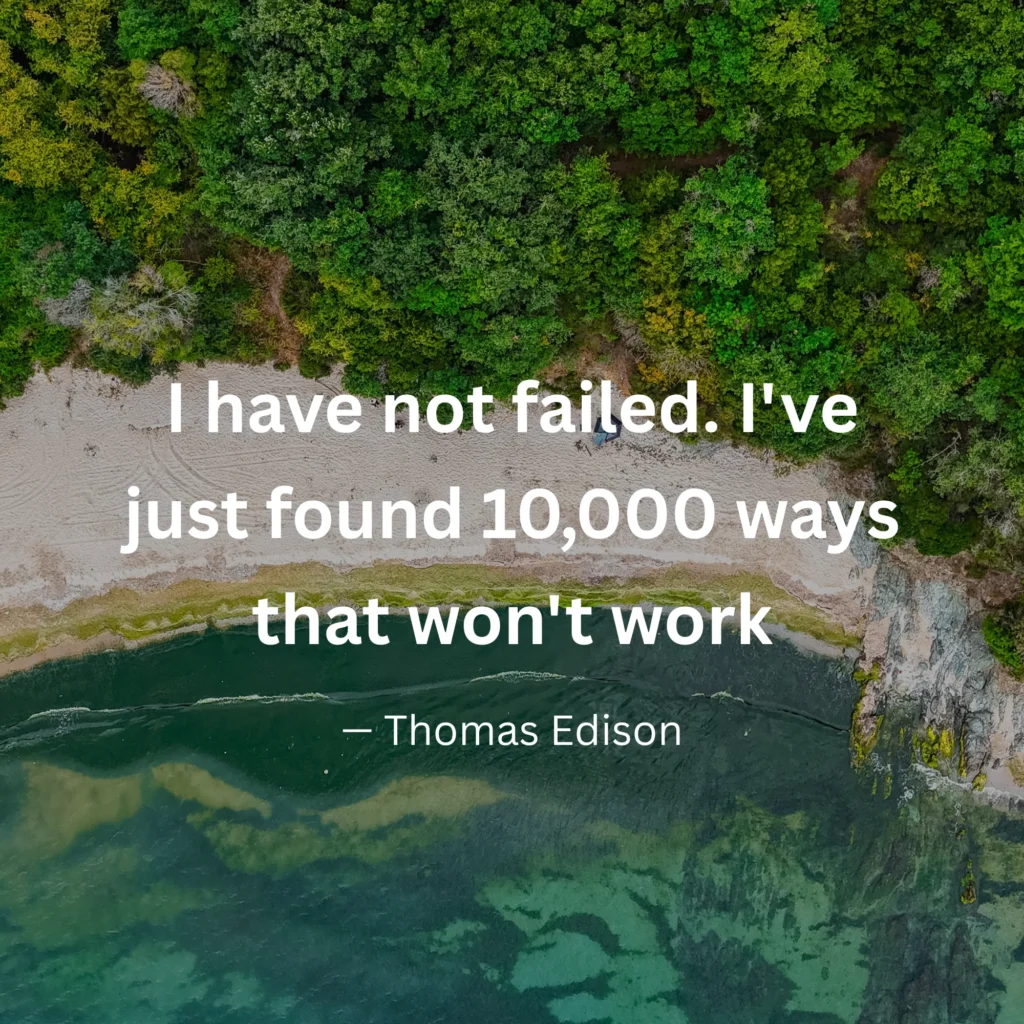 An inspirational graphic featuring an aerial view of a forested coastline with text: "I have not failed. I've just found 10,000 ways that won't work" – Thomas Edison