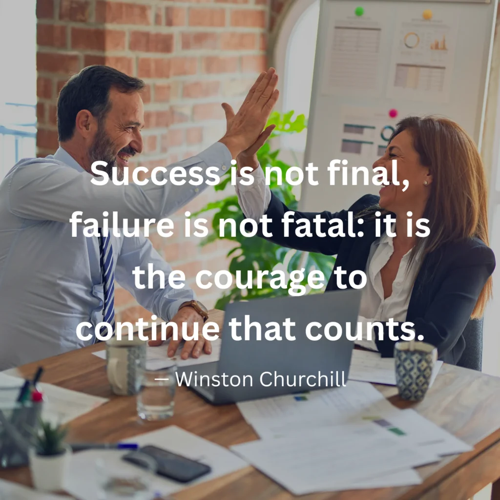 An inspirational graphic featuring two smiling colleagues high-fiving at an office desk with text: "Success is not final, failure is not fatal: it is the courage to continue that counts." – Winston Churchill